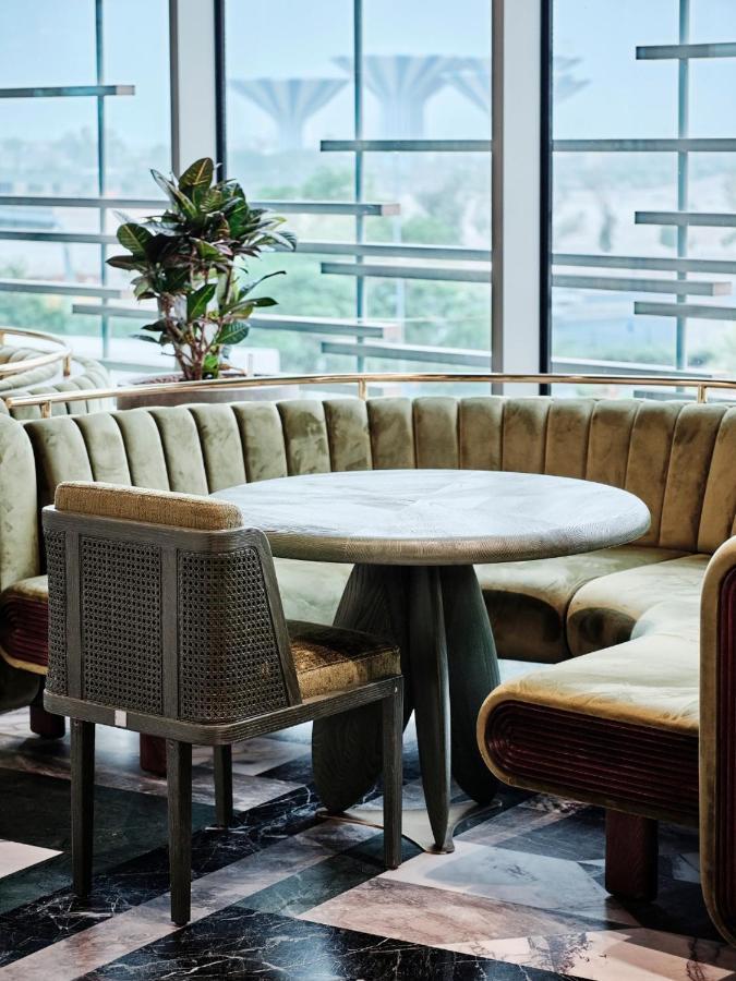 Grand Hyatt Kuwait Hotel Кувейт Екстериор снимка A table and chair